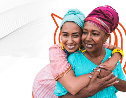 Mãe e filha negras, usando turbante se abraçando em campanha de Dia das Mães